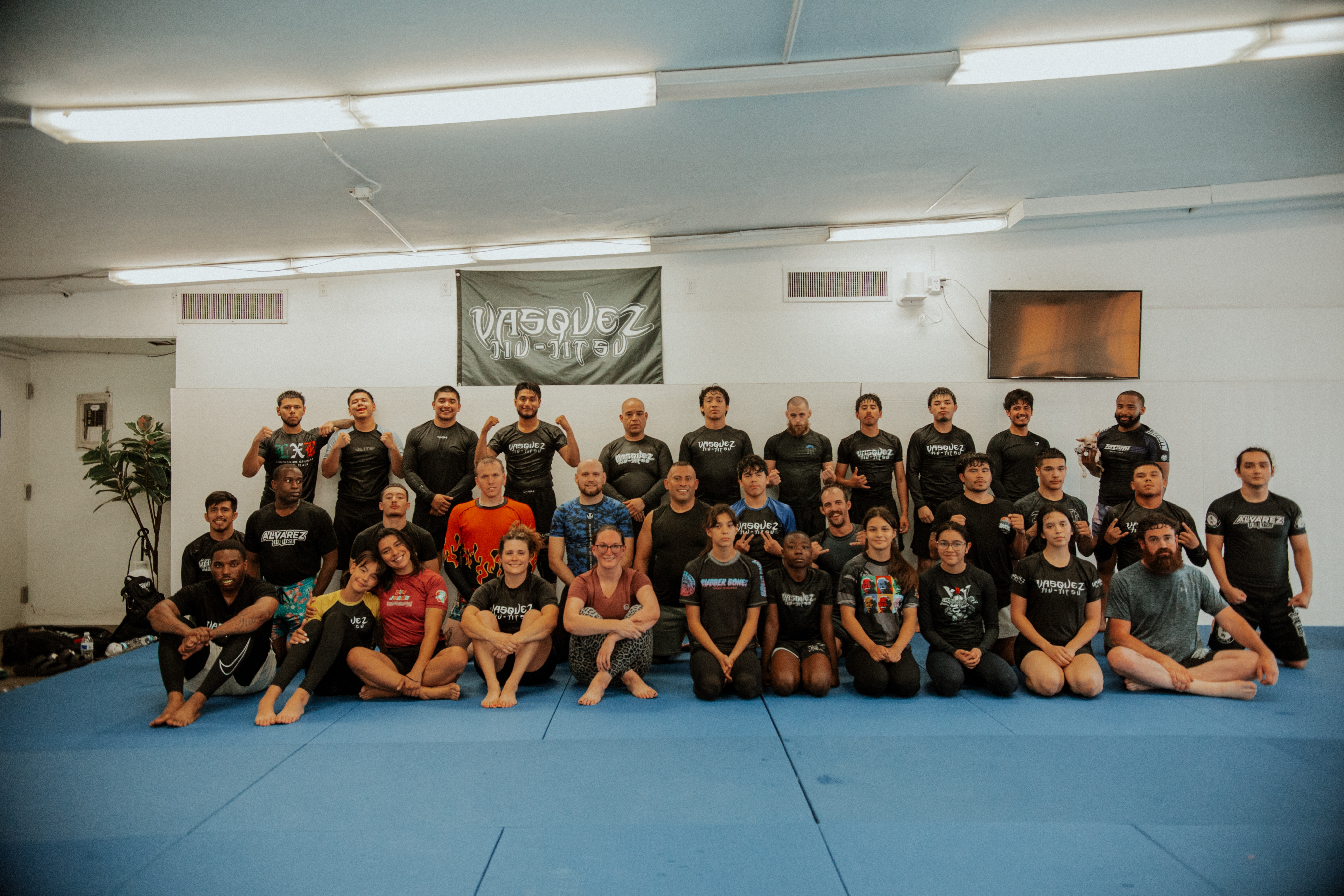 The Vasquez Jiu-Jitsu community together on the mat